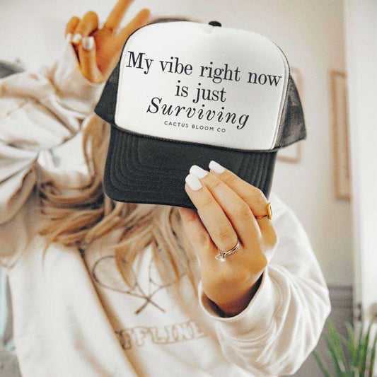 VIBE RIGHT NOW IS JUST SURVIVING EMBROIDERED TRUCKER HAT - Cactus Bloom Co.